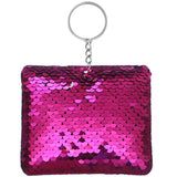 Soft and plush pink sequin keychain with a sparkling finish, perfect for adding a pop of color to any bag or keys.