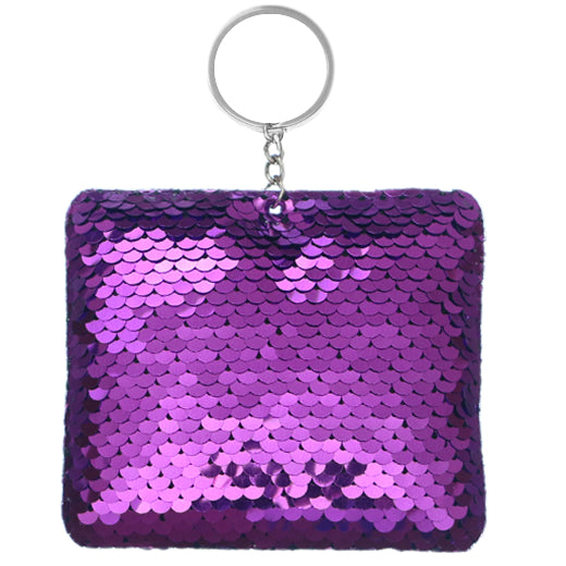 Cozy purple plush keychain with shiny sequins, ideal for adding a fun, sparkling accessory to your purse or keyring.