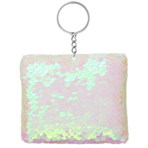 Iridescent white plush sequin keychain that transforms in the light, adding a soft, bright charm to your purse or bag.